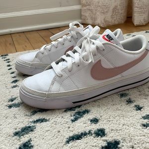 White and pink Nike sneakers